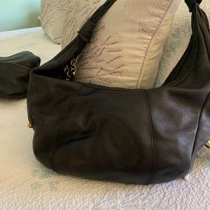 Gently used Allison Scott black hand bag.  Soft leather, large bag.